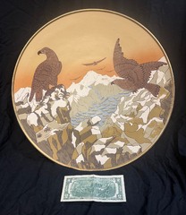 Villeroy & Boch 18" Mettlach, Geo Geesch #2645 glazed polychrome stoneware hanging charger featuring a pair of Golden Eagles. 1898–1901.